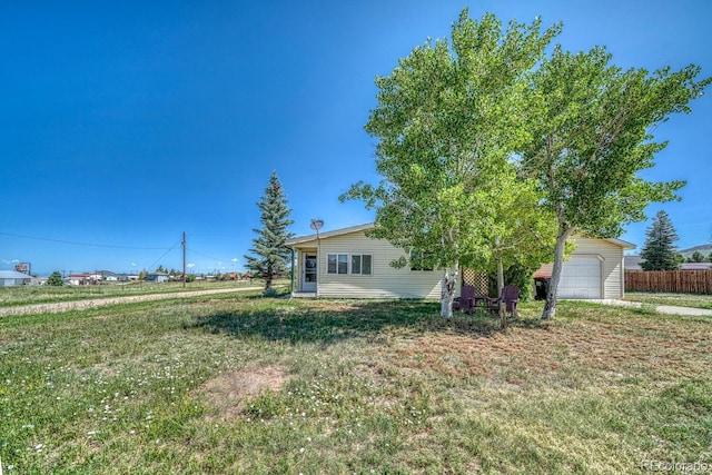 320 Hudson St, Silver Cliff, CO 81252 - view of front of house featuring a garage