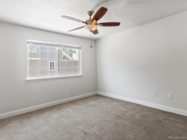 12403 E Tennessee Cir Unit E, Aurora, CO 80012 - spare room with ceiling fan and carpet floors