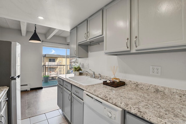 kitchen with gray cabinetry, a sink, freestanding refrigerator, white dishwasher, and baseboard heating