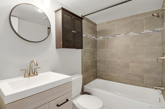 full bathroom featuring toilet, bathtub / shower combination, and vanity