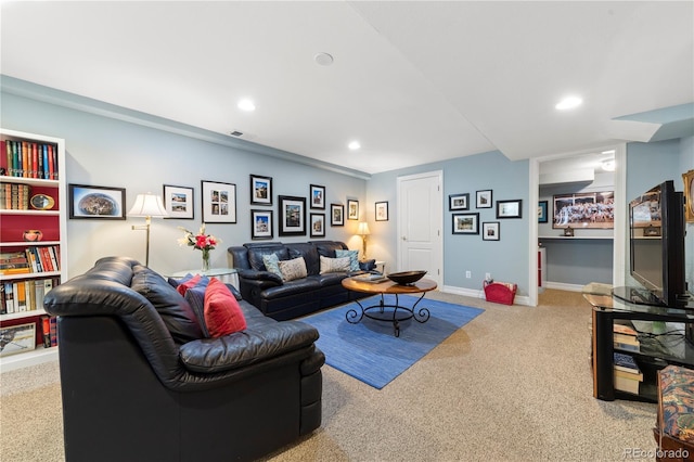 living area featuring recessed lighting, baseboards, and carpet floors