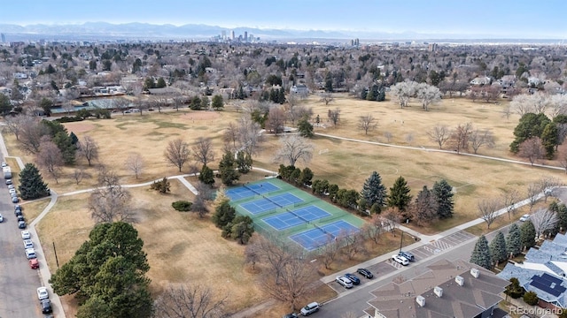 birds eye view of property with a mountain view