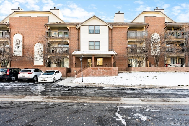 view of snow covered property