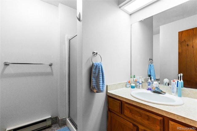 bathroom featuring vanity, walk in shower, and a baseboard heating unit