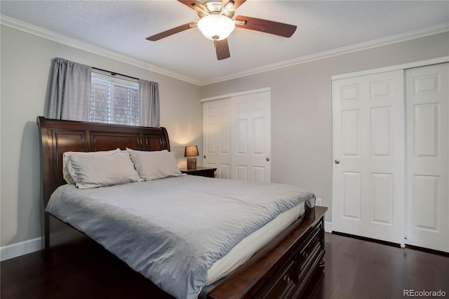 bedroom with crown molding, ceiling fan, dark hardwood / wood-style flooring, and a textured ceiling