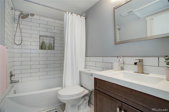 full bathroom featuring vanity, tile walls, shower / tub combo, and toilet