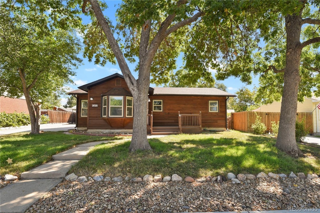 exterior space with a front yard