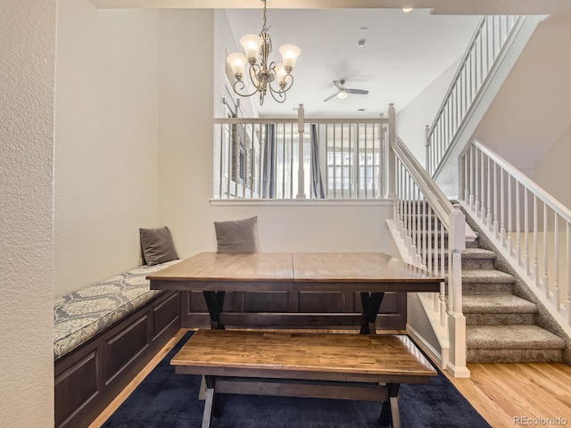 unfurnished dining area with light hardwood / wood-style flooring and ceiling fan