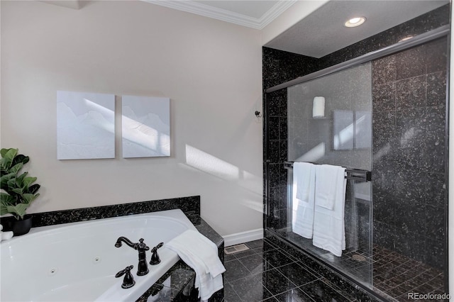 bathroom featuring a stall shower, visible vents, baseboards, a jetted tub, and crown molding