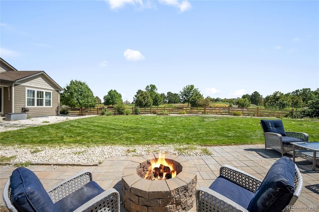 view of patio featuring a fire pit