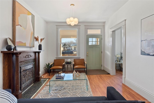 sitting room featuring hardwood / wood-style floors