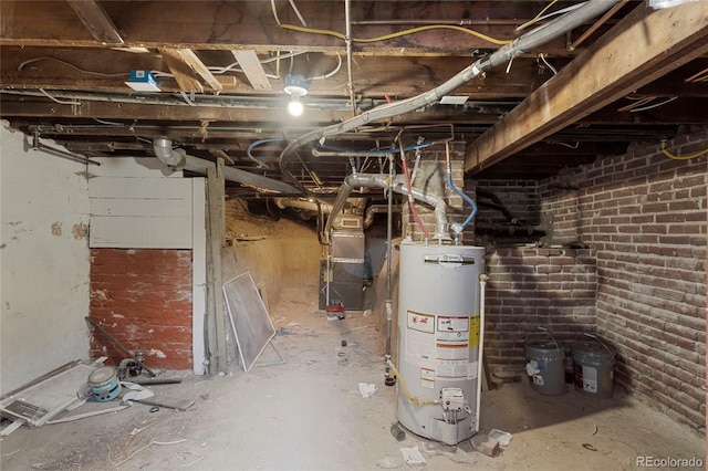 basement with water heater and heating unit