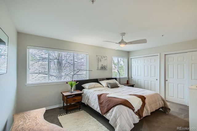 3228 47th, Boulder, CO 80301 - carpeted bedroom featuring two closets, baseboards, and ceiling fan