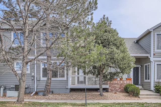3228 47th, Boulder, CO 80301 - view of property hidden behind natural elements with roof with shingles