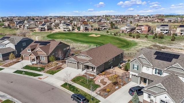 birds eye view of property with a residential view and golf course view