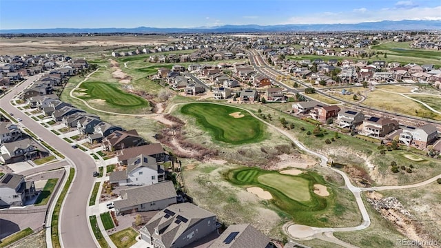 bird's eye view featuring a mountain view, a residential view, and golf course view