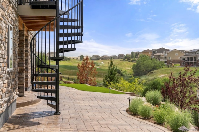 7965 S Vandriver Way, Aurora, CO 80016 - view of patio / terrace with stairs and a residential view