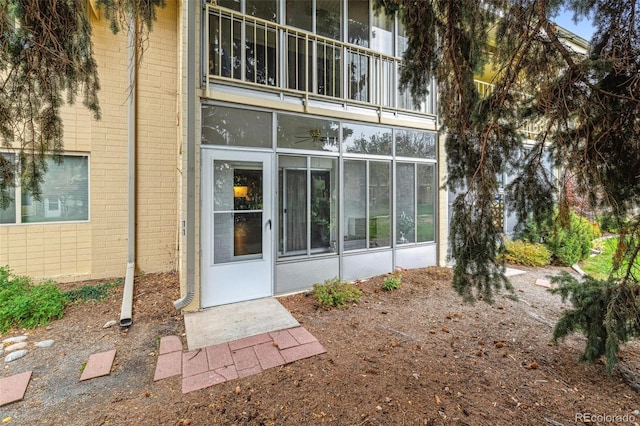 entrance to property featuring a balcony