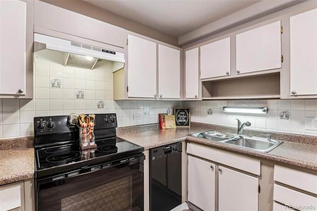 kitchen with black appliances, decorative backsplash, white cabinets, and sink