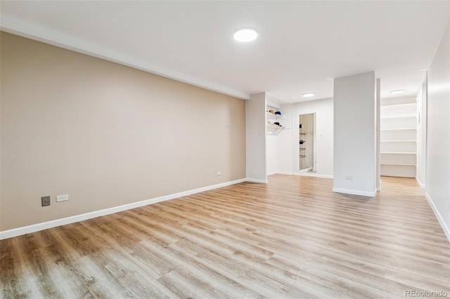 unfurnished living room with light wood-type flooring