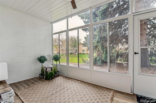 sunroom / solarium with ceiling fan