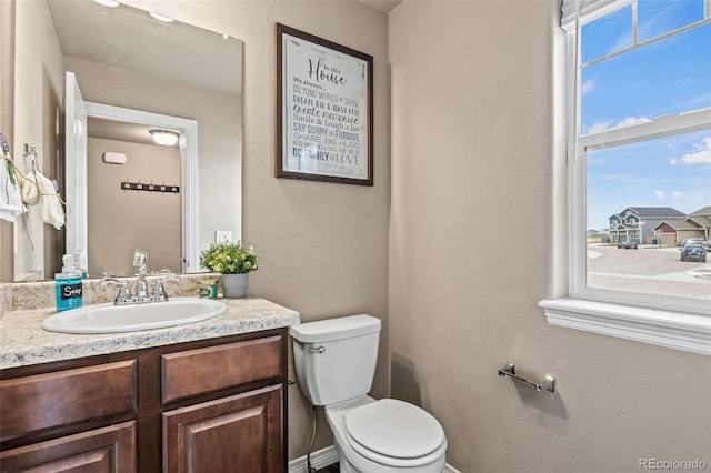9840 Castor Dr, Colorado Springs, CO 80925 - bathroom with toilet and vanity