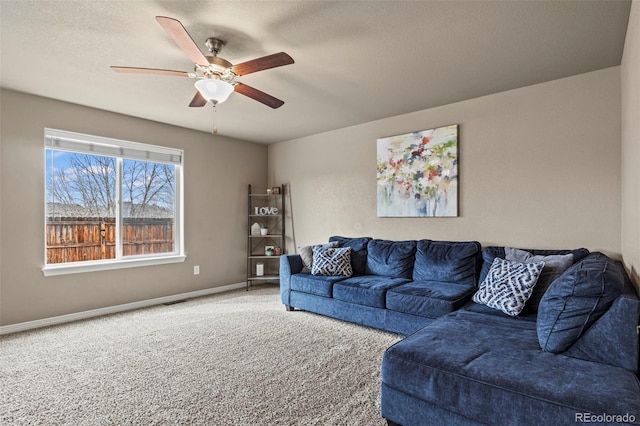 9840 Castor Dr, Colorado Springs, CO 80925 - carpeted living room featuring visible vents, a textured ceiling, baseboards, and ceiling fan