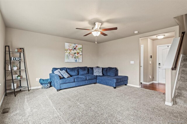 9840 Castor Dr, Colorado Springs, CO 80925 - carpeted living area featuring baseboards, visible vents, and a ceiling fan