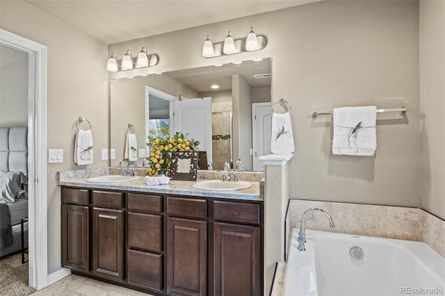 9840 Castor Dr, Colorado Springs, CO 80925 - bathroom with a bath, double vanity, a sink, and a shower stall