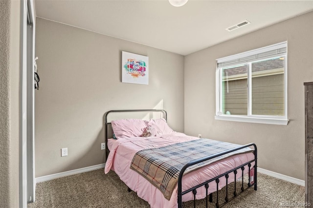 9840 Castor Dr, Colorado Springs, CO 80925 - bedroom with baseboards, carpet flooring, and visible vents