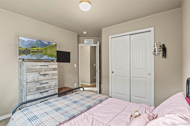 9840 Castor Dr, Colorado Springs, CO 80925 - carpeted bedroom with a closet and baseboards
