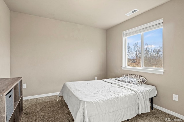9840 Castor Dr, Colorado Springs, CO 80925 - bedroom with baseboards, visible vents, and carpet flooring