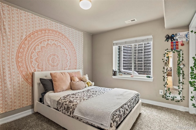 9840 Castor Dr, Colorado Springs, CO 80925 - bedroom featuring carpet floors, baseboards, and visible vents