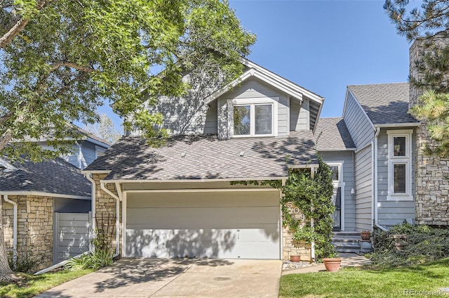 front of property with a garage