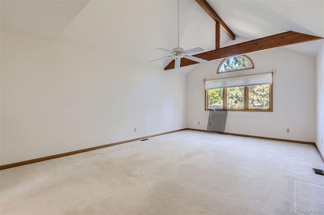 carpeted spare room with ceiling fan, high vaulted ceiling, and beam ceiling