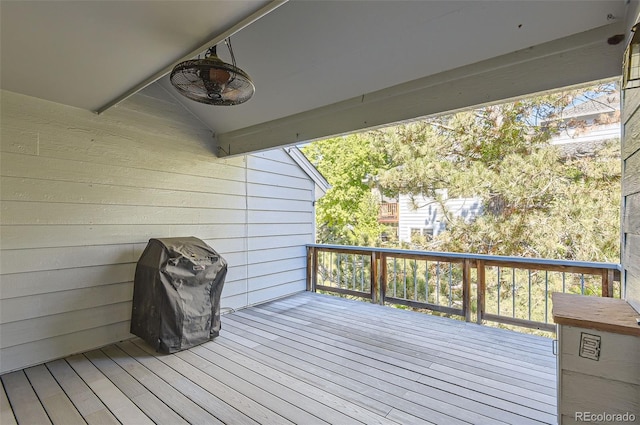 wooden terrace with grilling area