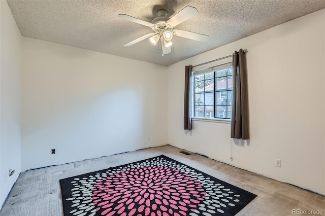 8136 Washington St Unit 141, Denver, CO 80229 - carpeted spare room featuring ceiling fan and a textured ceiling
