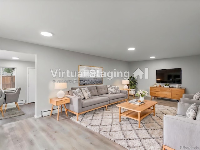 living room featuring a baseboard radiator and wood-type flooring