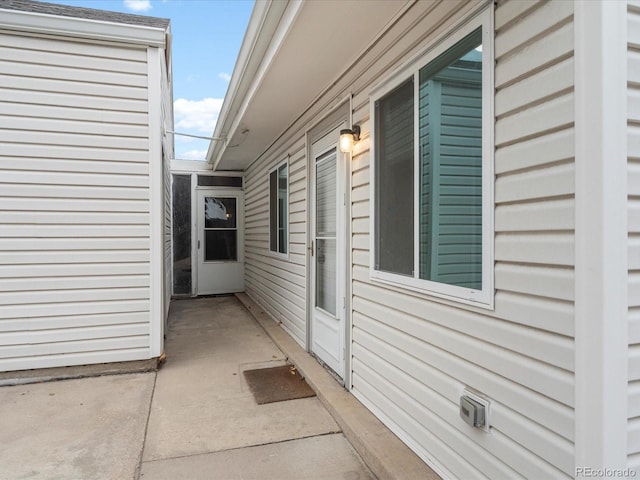 view of property exterior with a patio