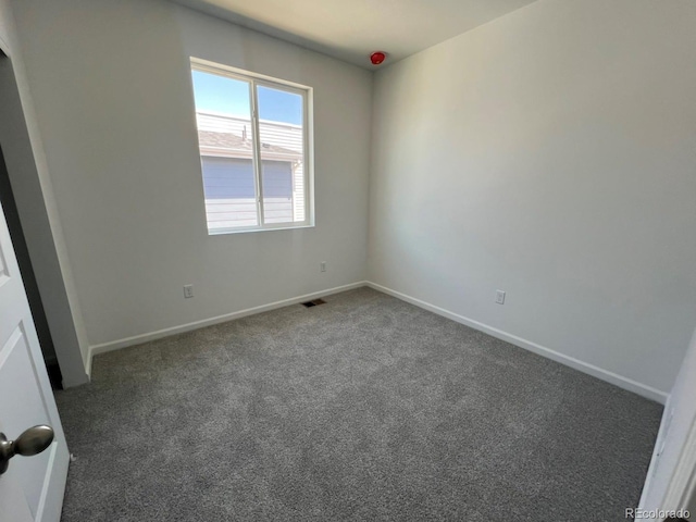 6638 N Nepal Ct, Aurora, CO 80019 - carpeted spare room with baseboards