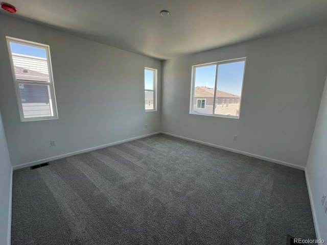 6638 N Nepal Ct, Aurora, CO 80019 - empty room with carpet and baseboards
