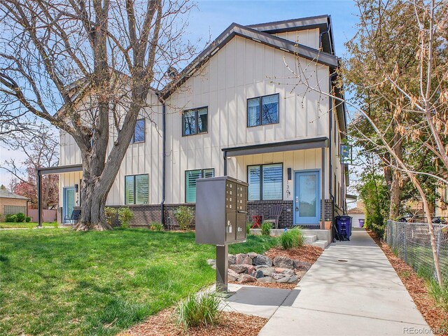 1303 Jersey St, Denver, CO 80220 - view of front facade featuring board and batten siding