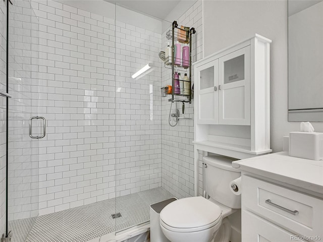 1303 Jersey St, Denver, CO 80220 - bathroom featuring a shower stall, toilet, and vanity