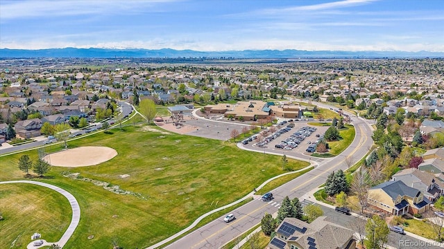 drone / aerial view featuring a mountain view and a residential view