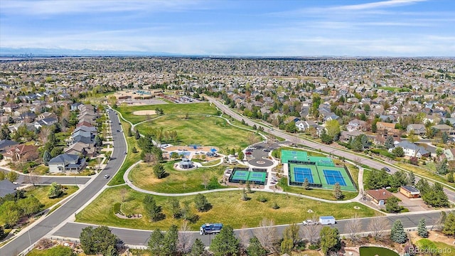 birds eye view of property with a residential view
