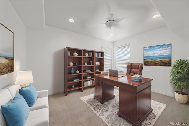 office featuring a ceiling fan, baseboards, recessed lighting, and light colored carpet