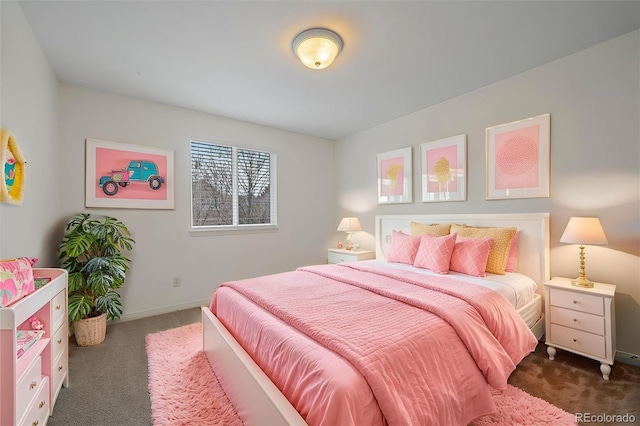 carpeted bedroom with baseboards