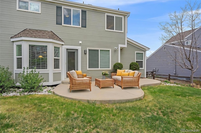 back of property with a yard, a patio area, outdoor lounge area, and fence