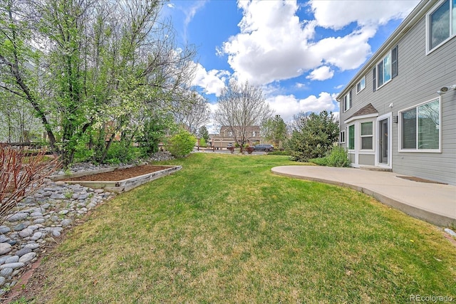 view of yard with a patio area