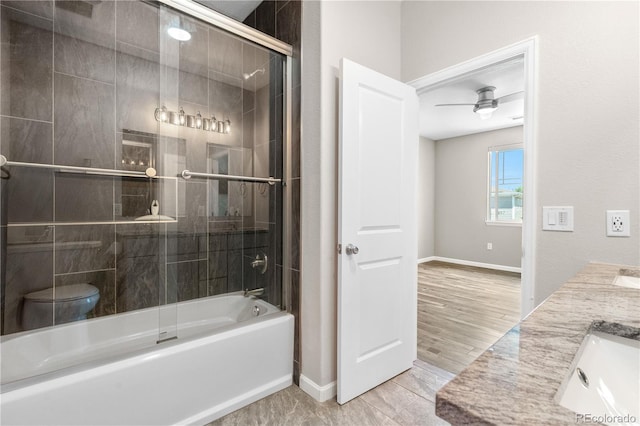 847 E 98th Ave Unit 1806, Thornton, CO 80229 - bathroom featuring bath / shower combo with glass door, baseboards, double vanity, and ceiling fan